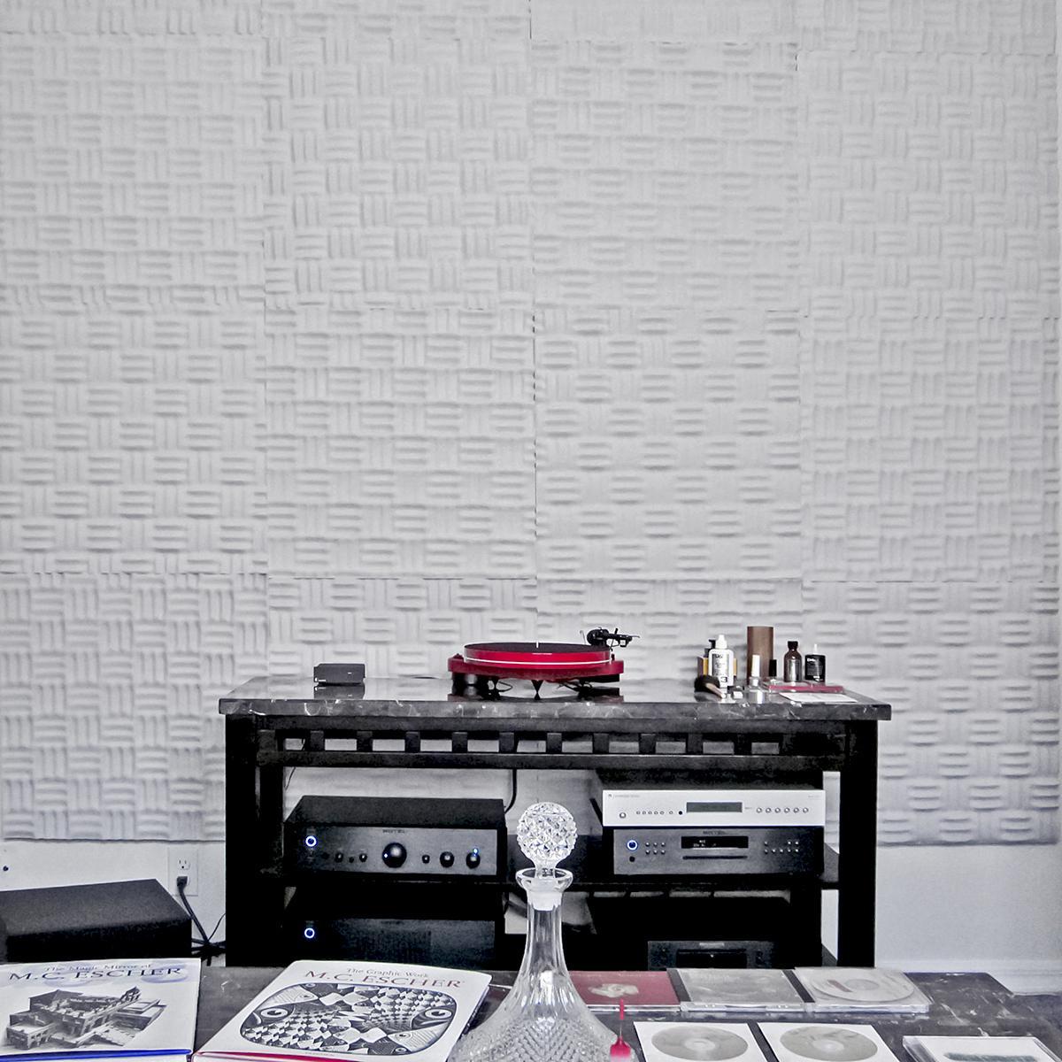 Acoustic foam helps Eric achieve optimal sound system performance in his home media room.