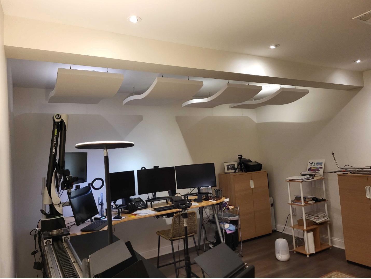 Whisperwave Clouds reduce reverberation in an office space.