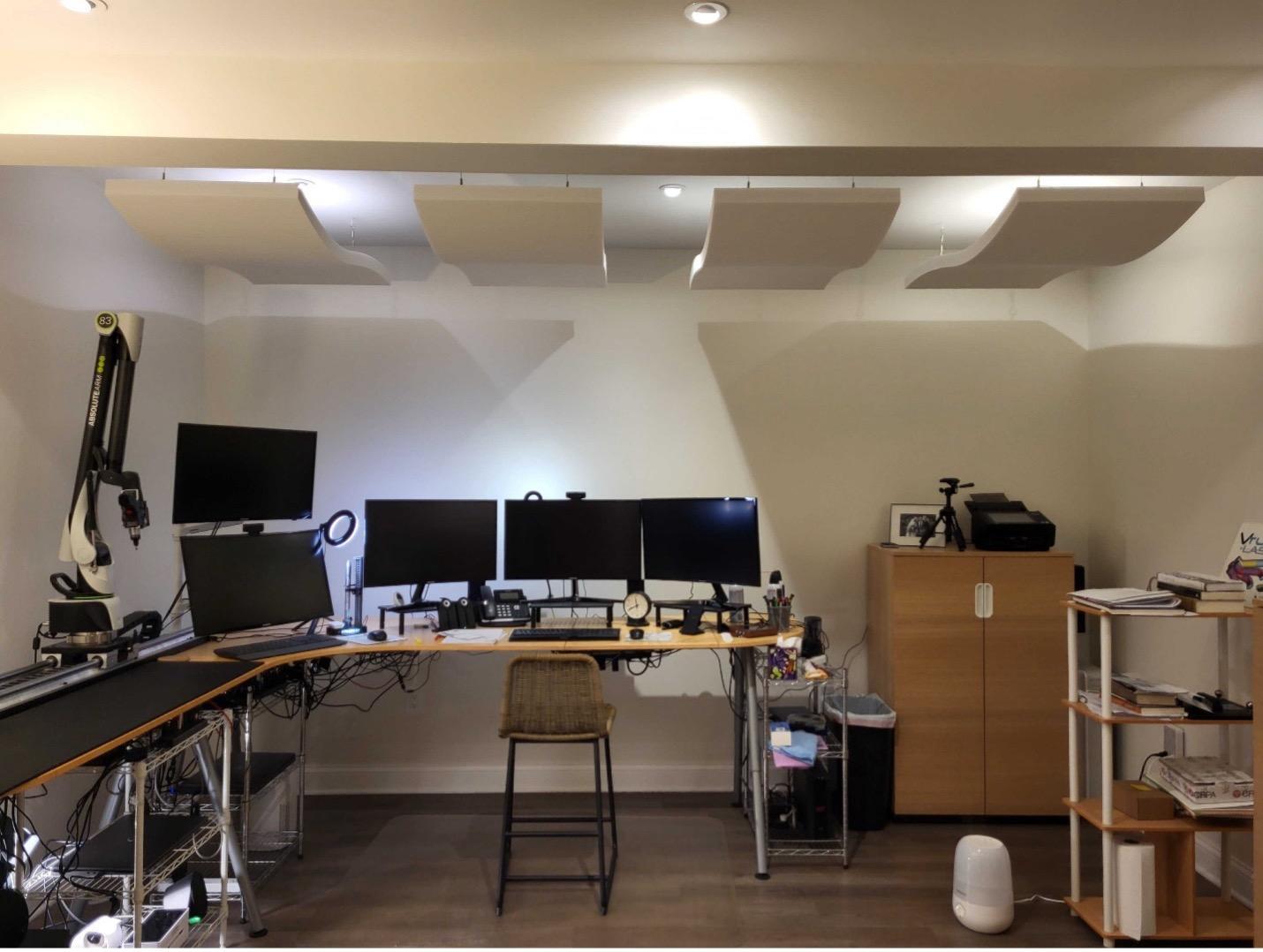 At the Advanced Tubular Technologies office, Whisperwave Clouds hang from the ceiling to reduce echo.