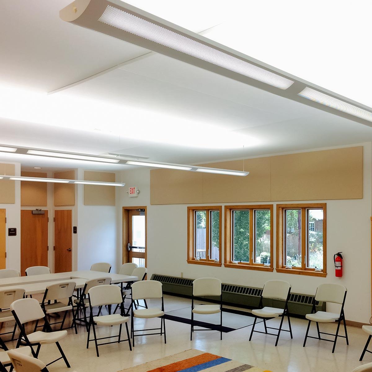 Acoustic panels on the floor and ceiling at Advent Lutheran Church treat loud sound in the space.