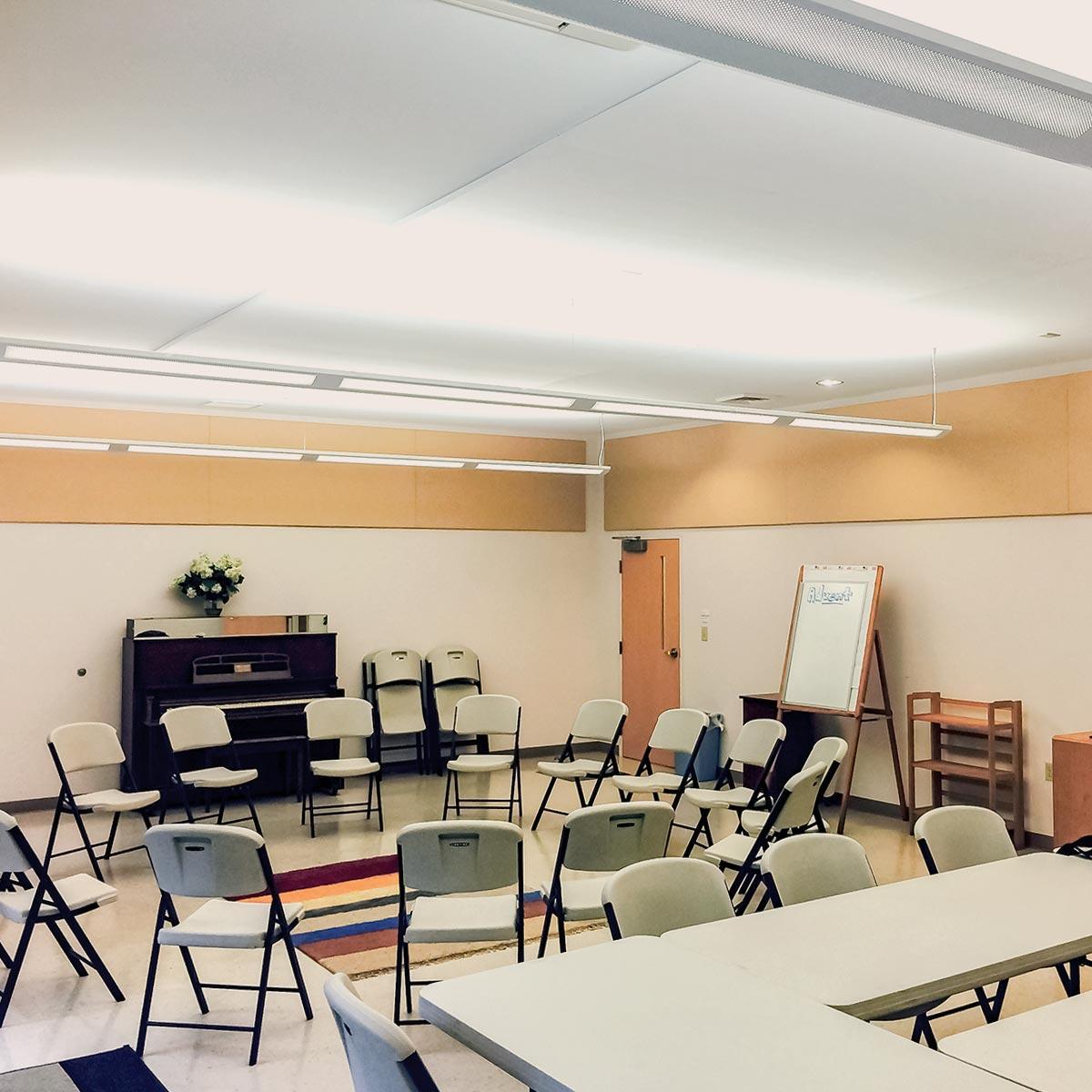 Fabric wrapped panels reduce noise in the Worship Assembly room at Advent Lutheran Church.