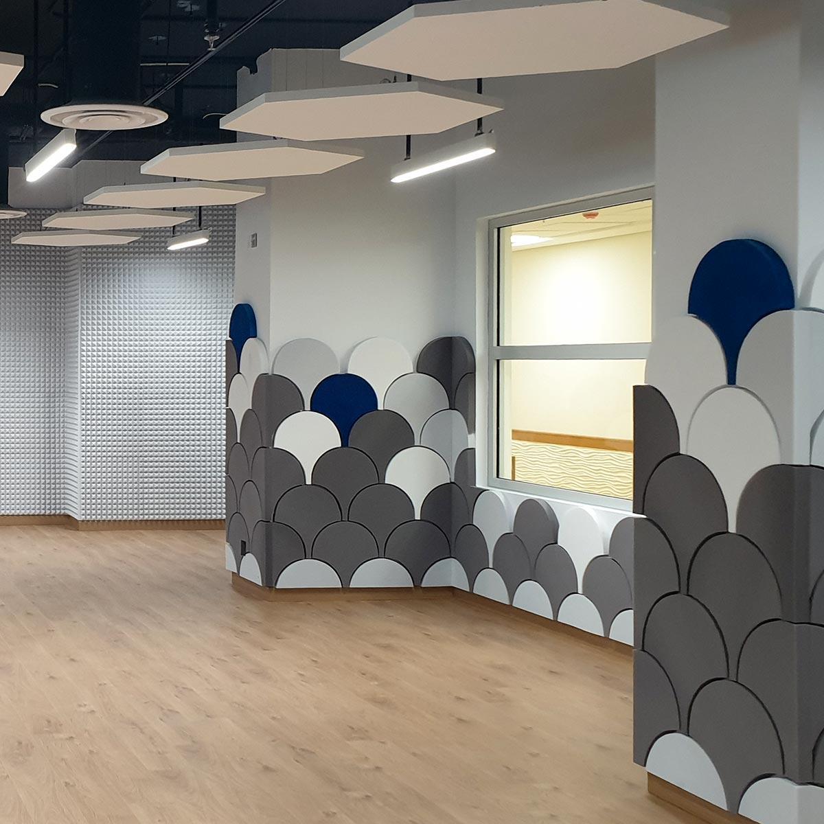 American International School of Jeddah - For this project, the contractor installed cut and painted Flat Acoustical Foam, in combination with our Pyramid Acoustic Foam, for a unique, designer finish.