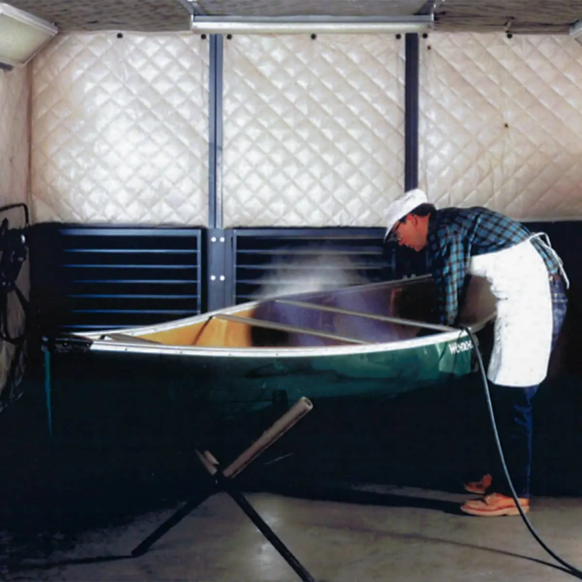 The AlphaSorb® Dual-Sided Absorptive Sound Blanket helps to reduce the ambient noise levels in and around this industrial booth.