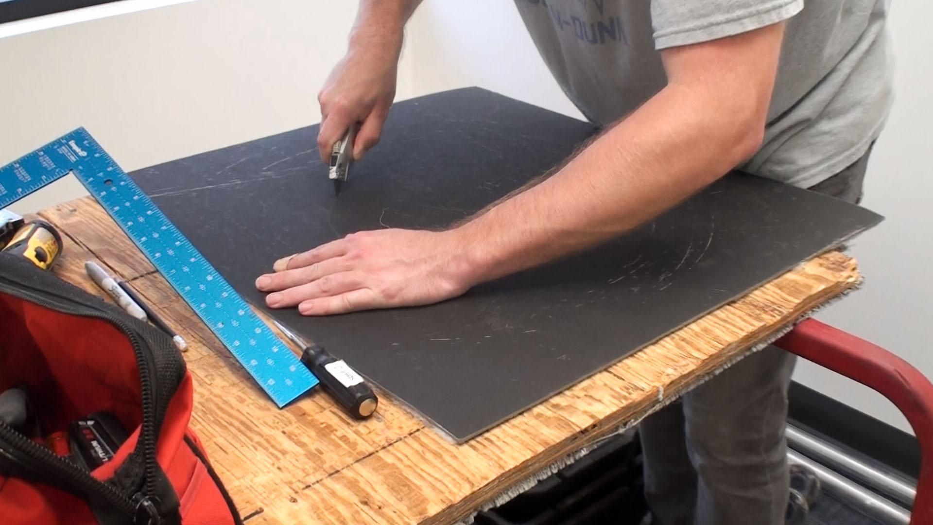 Using a sharp knife, cut the shape out of the Ceiling Tile Barrier