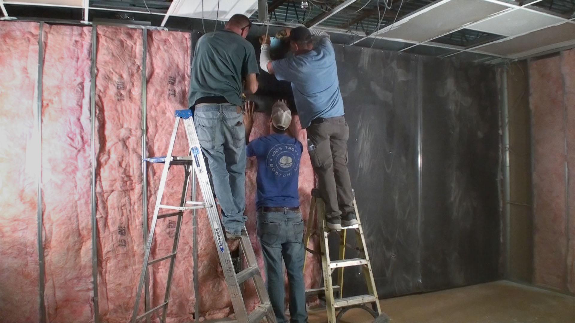 Our installers trim the MLV to size before adding it to walls
