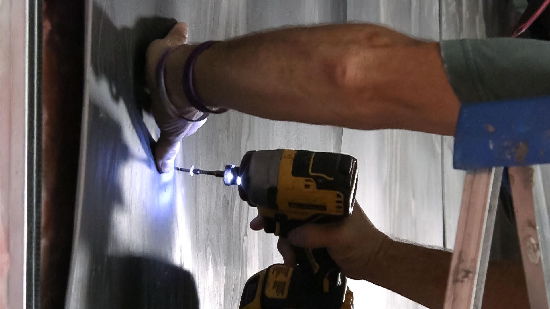 MLV is screwed onto the studs by our installer