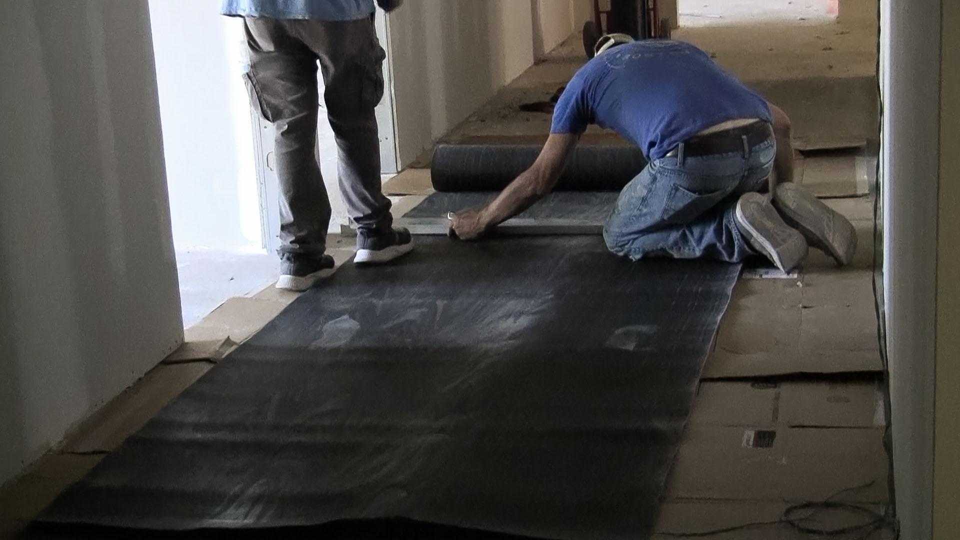 Our installers trim MLV to size before adding it to walls
