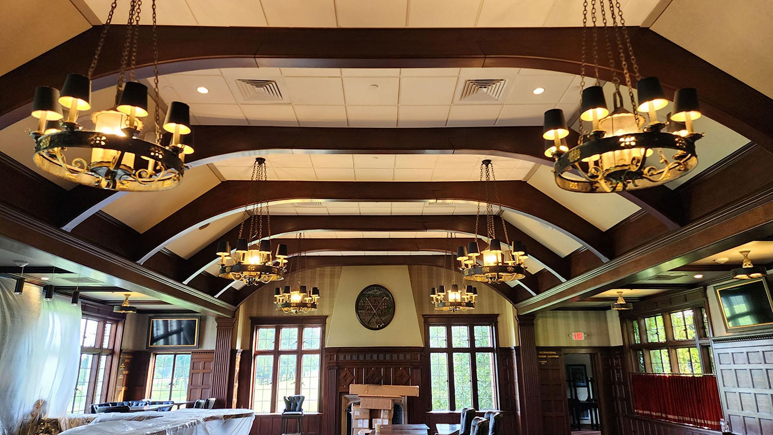 Baltusrol Golf Course Clubhouse Dining Room with our Acoustiwall product installed between the rafters and above the fireplace mantel