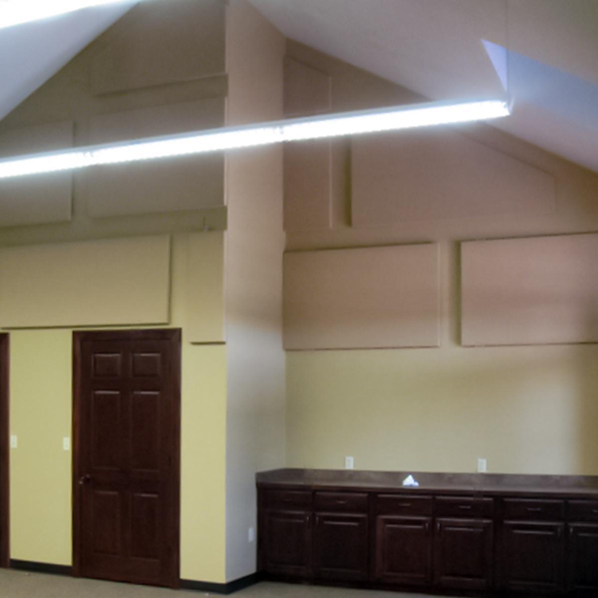 Fabric Wrapped Acoustic panels on the walls in a banking company training room.