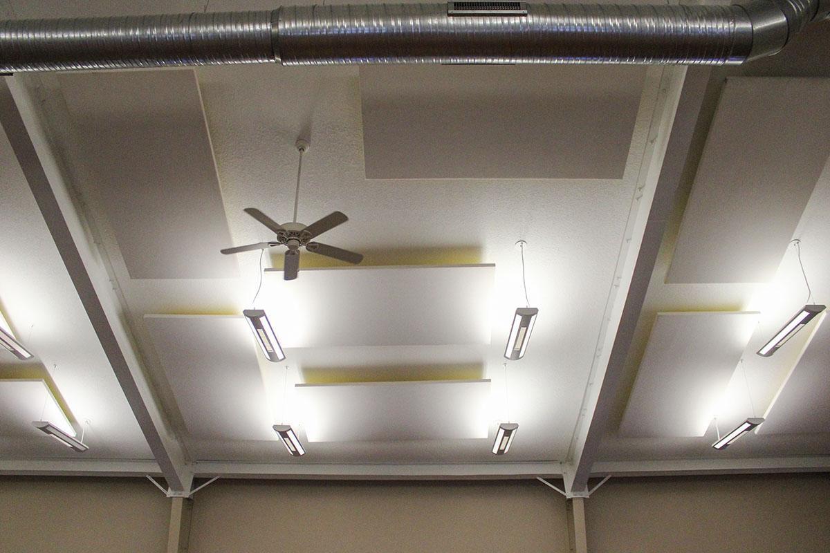 Fabric wrapped acoustic panels on the ceiling at Basehor United Methodist Church.