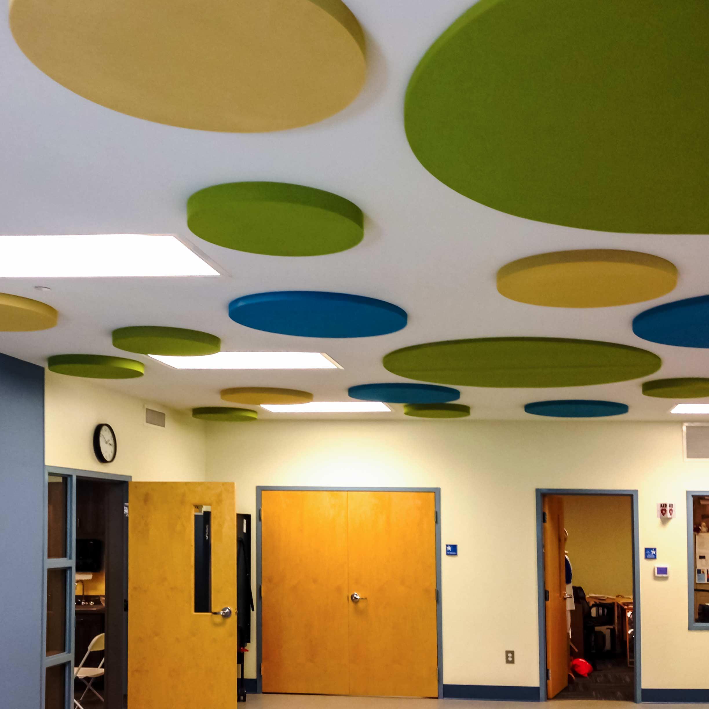 Custom cut flat foam was painted on site to create a unique and creative look for this learning facility.