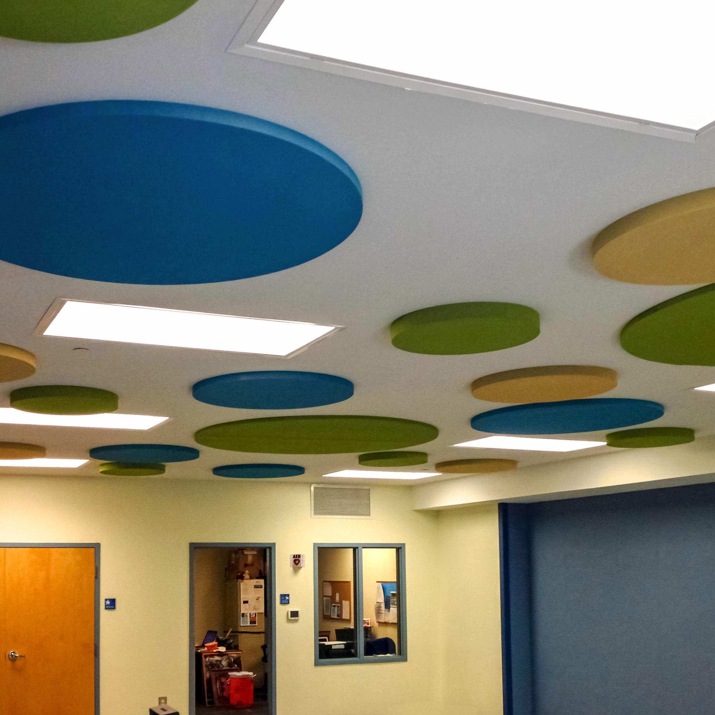 Flat Foam custom cut into circles make a fun and interesting acoustical treatment.