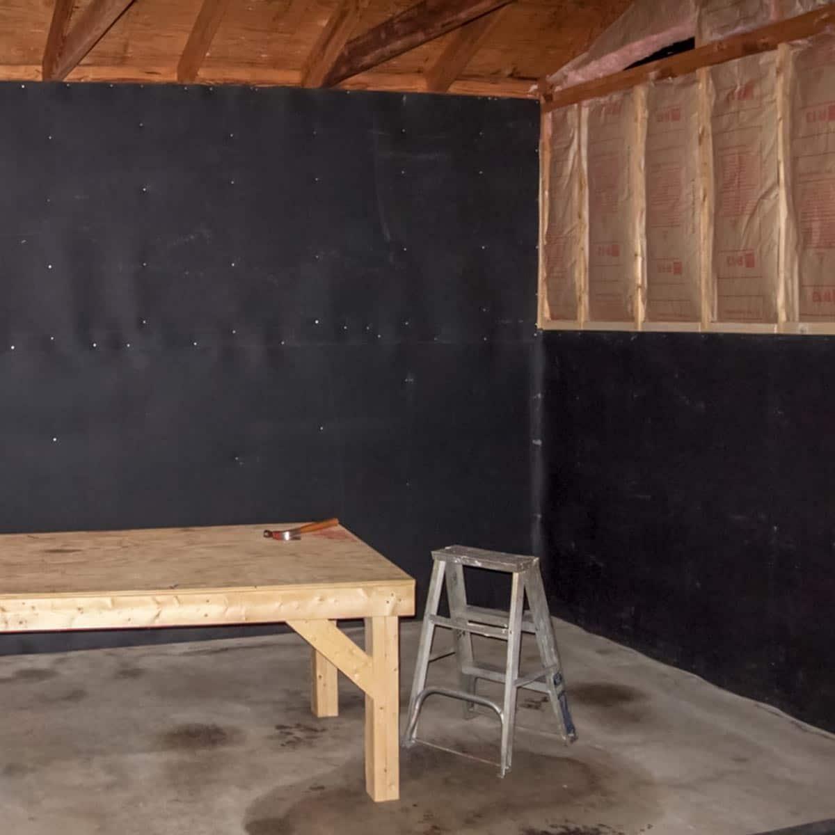 Soundproofing a Garage — Second layer of MLV Sound Barrier going up.