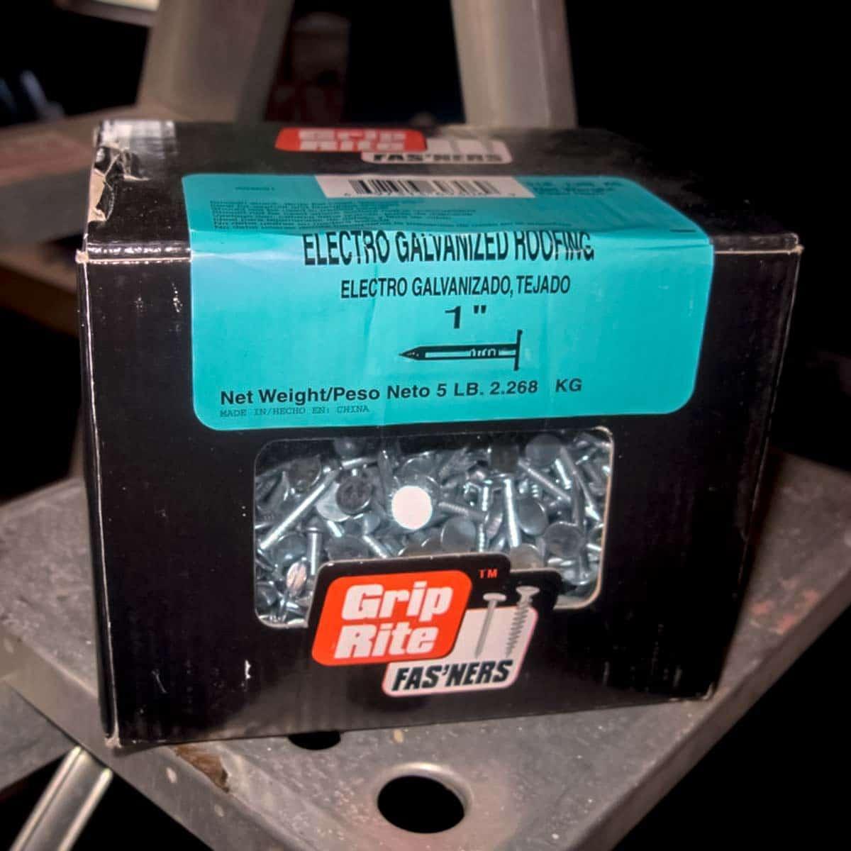 Soundproofing a Garage — Large head roofing nails were used to attach and hold the barrier to the studs. They provide more surface area for hold as well as covering the penetration made by the nail.
