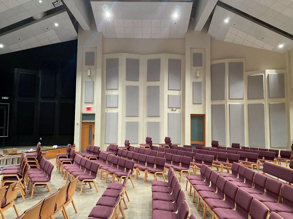 In the Bright Christian Church worship center, acoustic fabric wrapped panels reduce reverberation and echo.