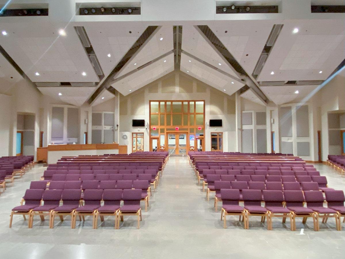 Fabric wrapped panels reduce echo in the Bright Christian Church worship center.