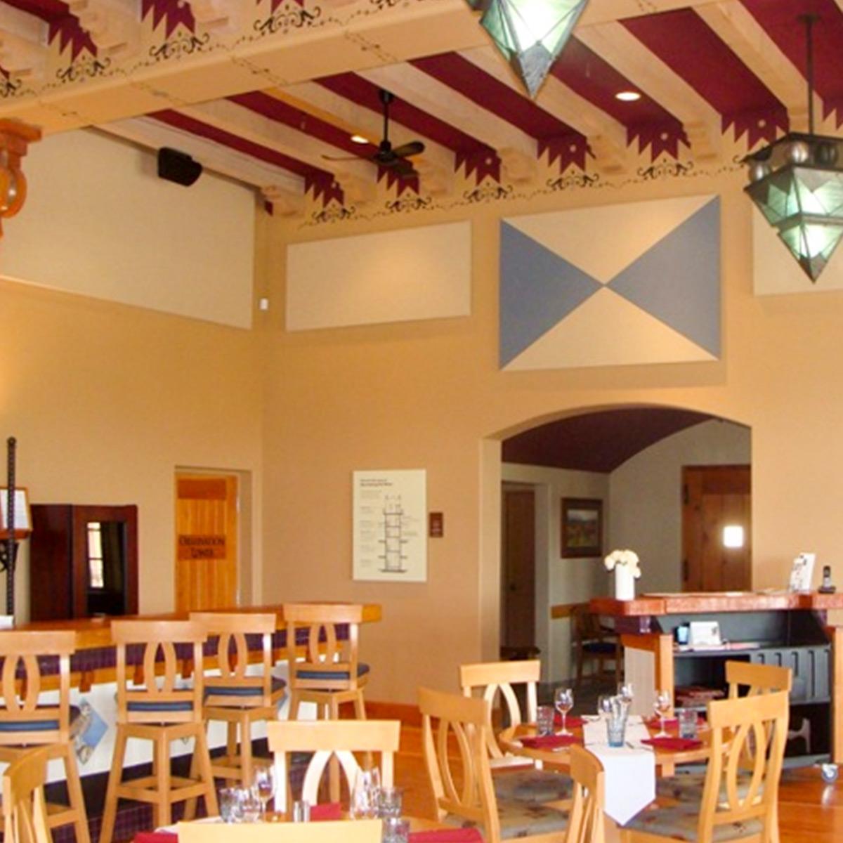 Acoustic wall panels reudce echo and noise level in a winery's restaurant and tasting room.