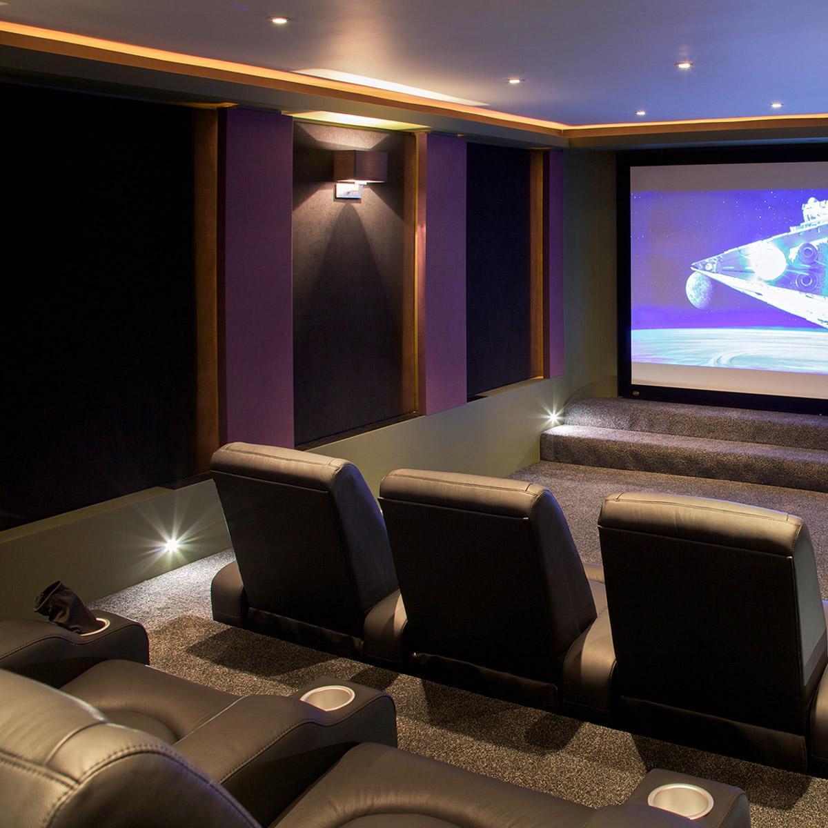 Acoustic fabric wrapped panels absorb sound in a CEDIA honored home theater.