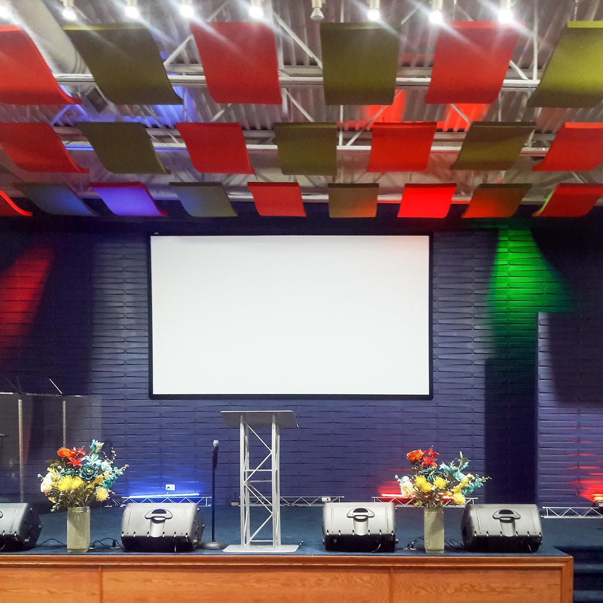 A combination of HPC Coated Colors create a unique look for these Whisperwave Clouds in the sanctuary at the Christ Healing Evangelical Church in South Holland, IL. Pictured are 2 foot by 4 foot clouds in olive green and orange red.