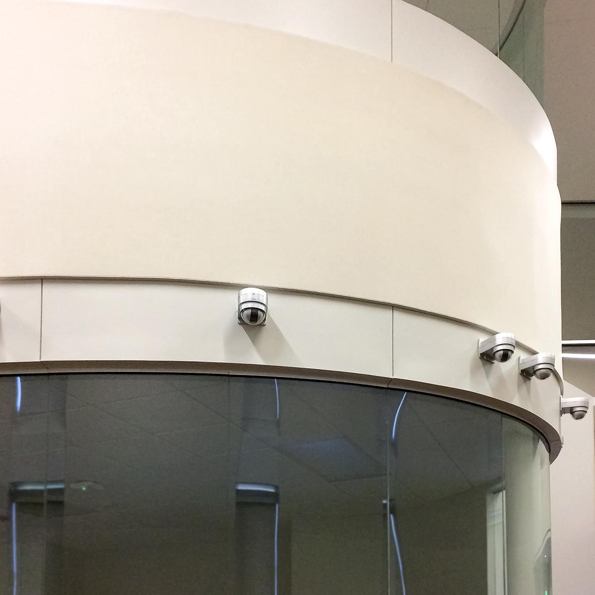 A combination of a stretch wall system and fabric wrapped acoustic panels reduce reverberation in a medical simulation laboratory.