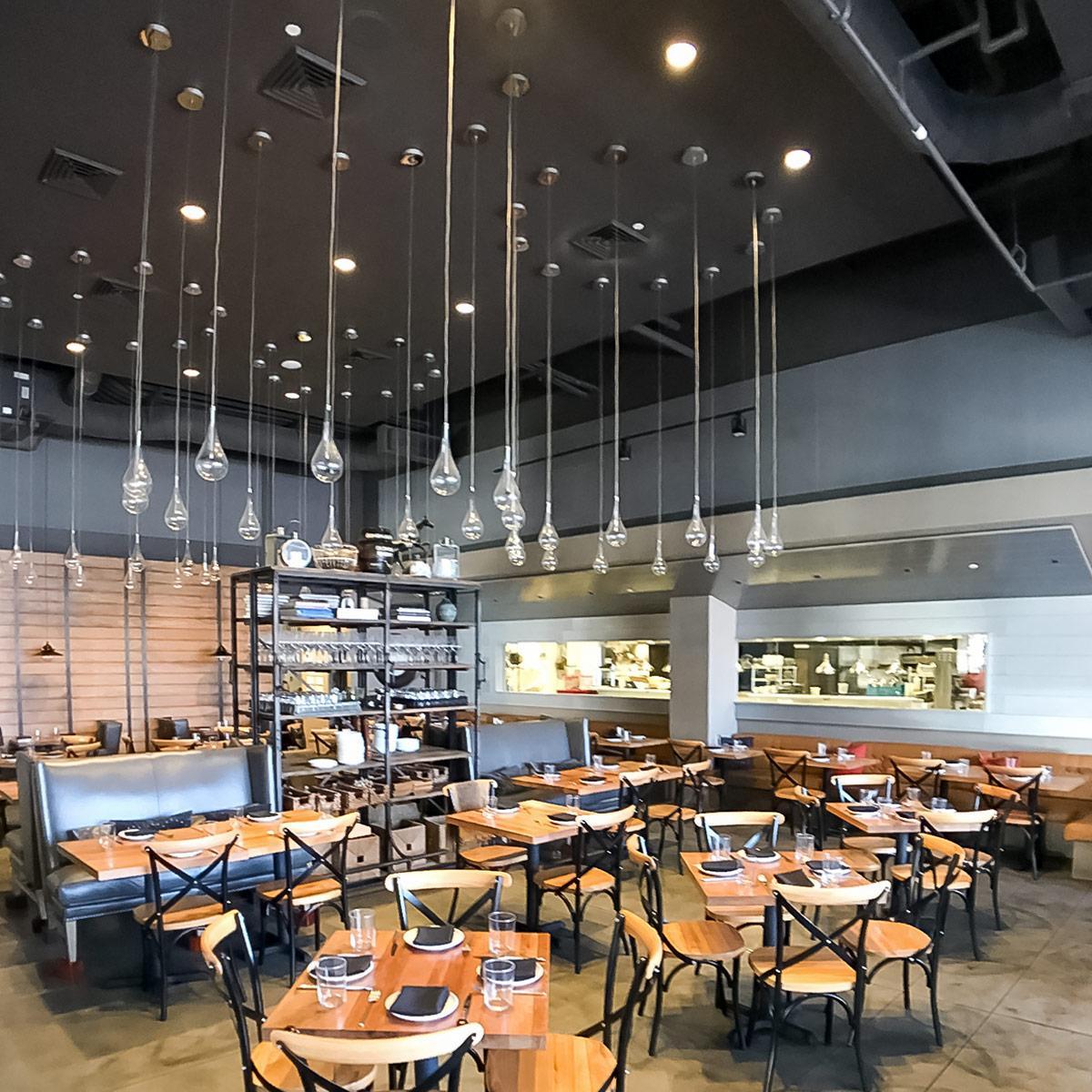 Fabric wrapped acoustic panels in the dining room at Cooks & Soldiers Tapas Restaurant reduce an oppressive level of noise.