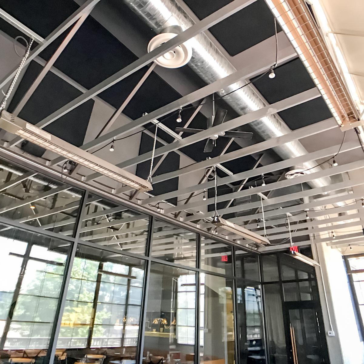At Cook & Soldiers Tapas Restaurant,  fabric wrapped panels treat the acoustics in the indoor and patio dining rooms.