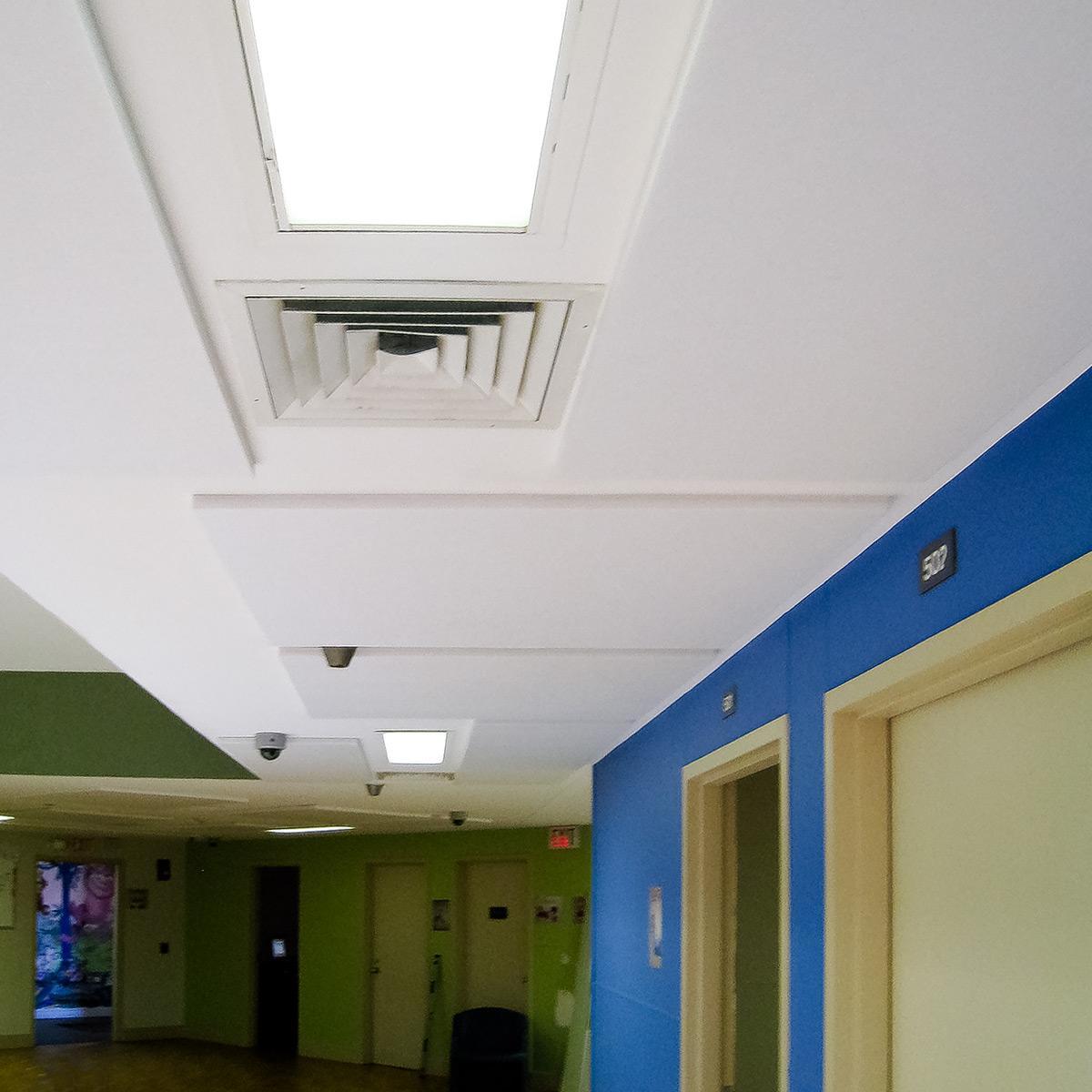 Cumberland Children’s Hospital - Bright white PolyPhon™ Panes mounted to Children's Hospital ceiling for sound control.