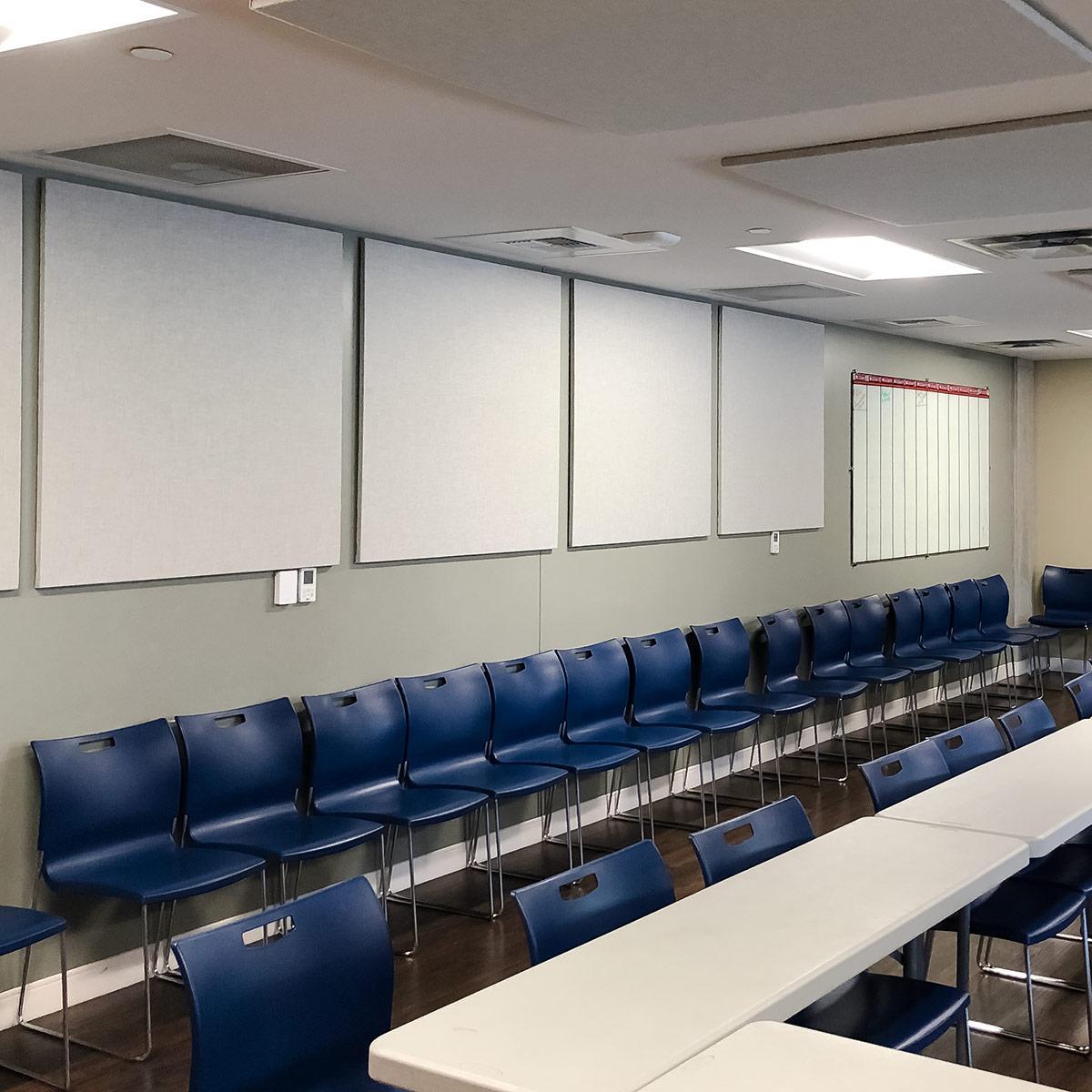 The Dallas 24 Hour Club installed a series of AlphaSorb® Fabric Wrapped Acoustic Panels to improve the sound quality of their meeting space.
