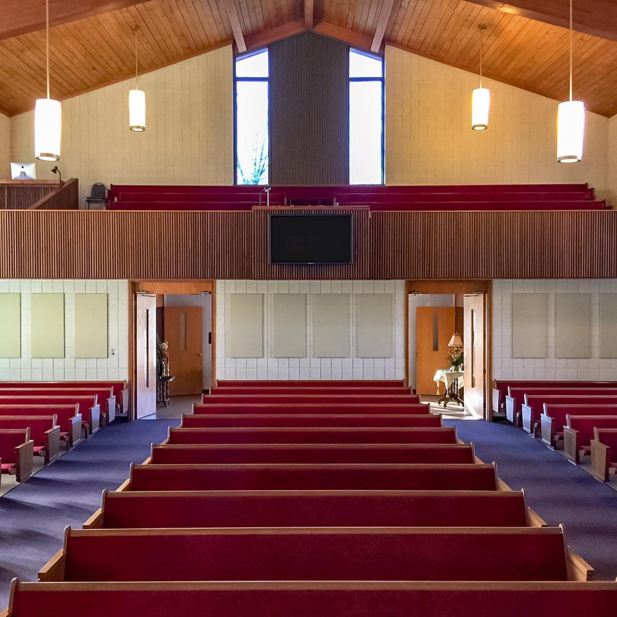Fabric wrapped panels line the walls of the First Baptist Church of Ironton improve speech intelligibility during sermons.
