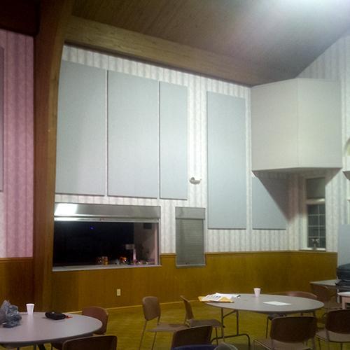 At the First Baptist Church of Rutherfordton, fabric wrapped panels reduce echo in the fellowship hall.