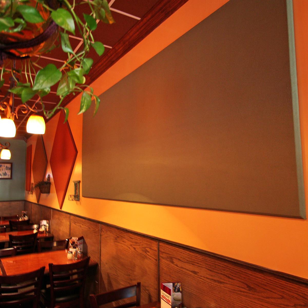 Different shaped and colored AlphaSorb® wall panels to tie in with existing design of room.