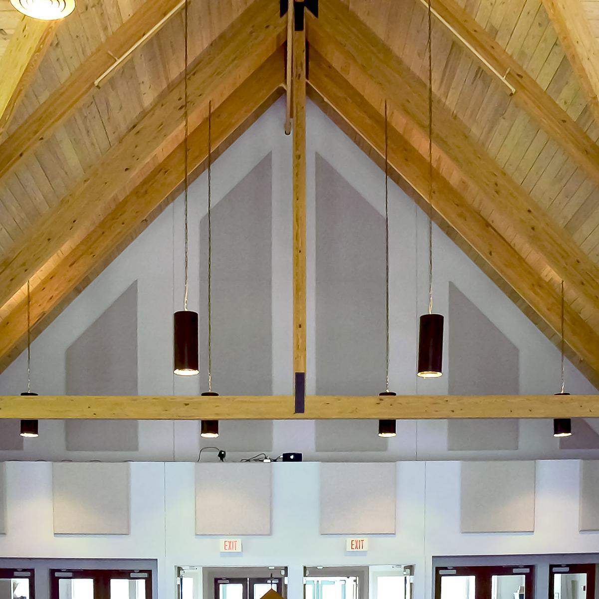 Fabric wrapped panels line the walls of the sanctuary at Gretna United Methodist Church to resolve an echo problem.
