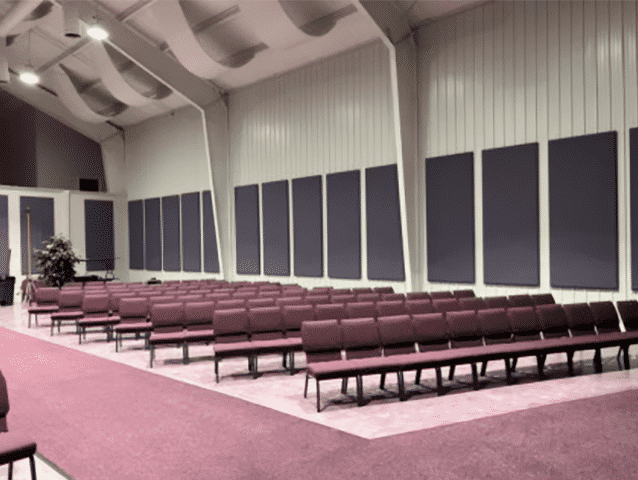 Fabric wrapped acoustic panels improve speech intelligibility in a church. 