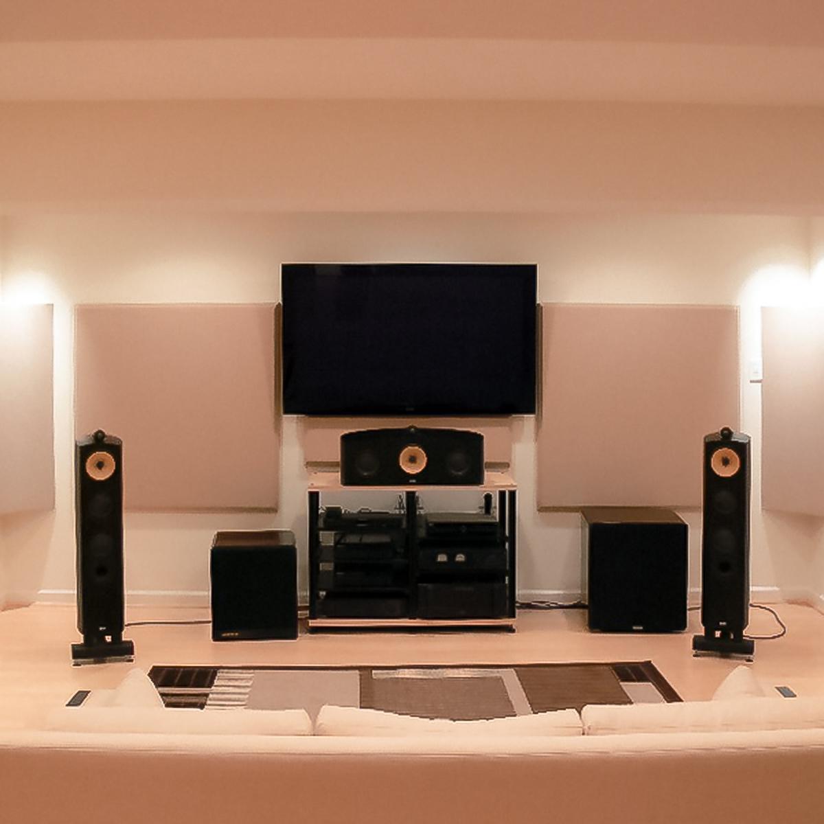 Fabric wrapped panels and bass traps optimize this room for high-end listening.