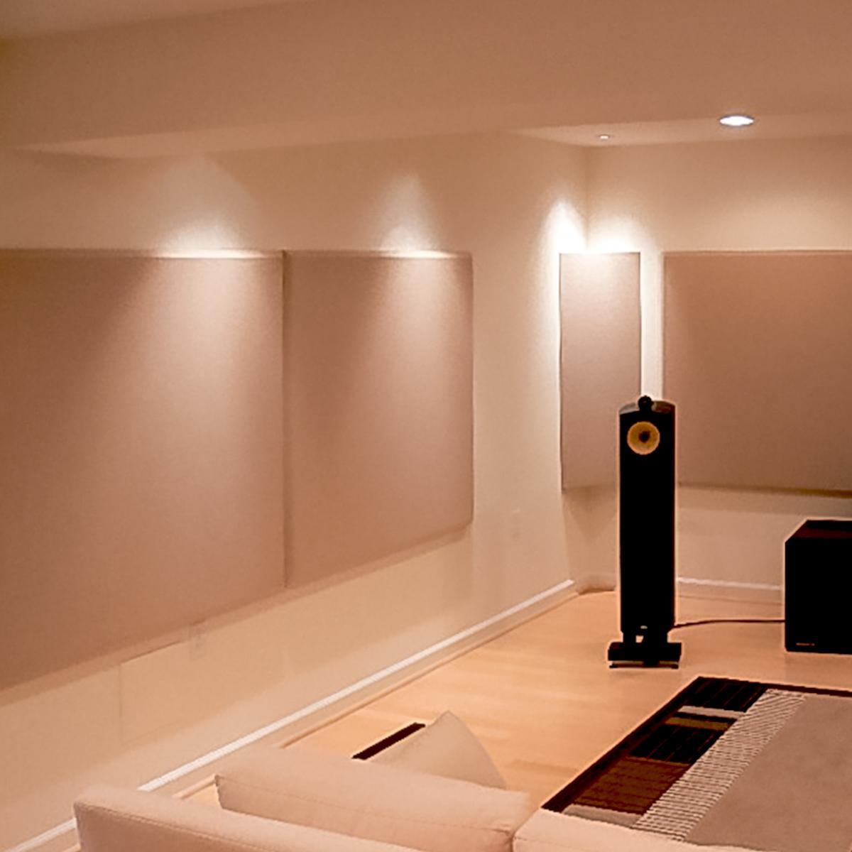 In a high-end listening room, fabric wrapped panels and bass traps create a clear, crisp sound.
