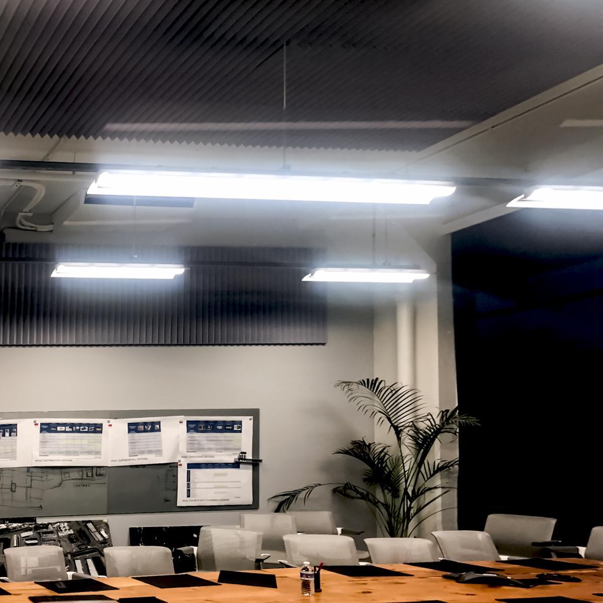 To reduce echo and enhance their office spaces, Hugo Neu Realty Management implemented a mix of acoustic baffles and foam panels.