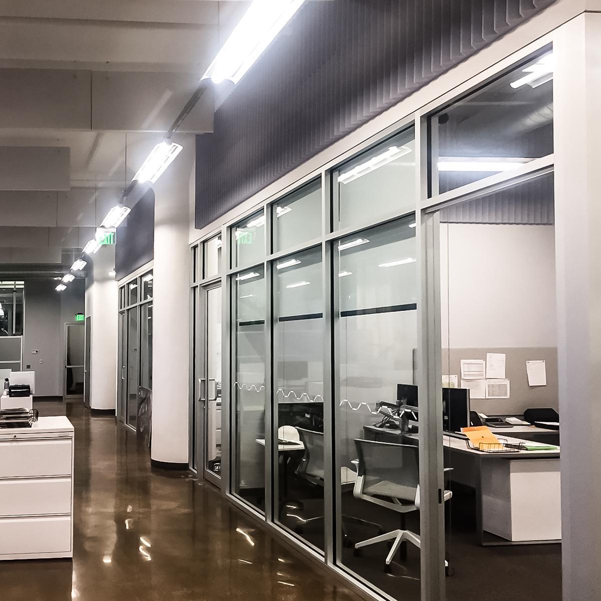 Hugo Neu Realty Management used a combination of acoustical foam and baffles to minimize echo and improve their office environments.