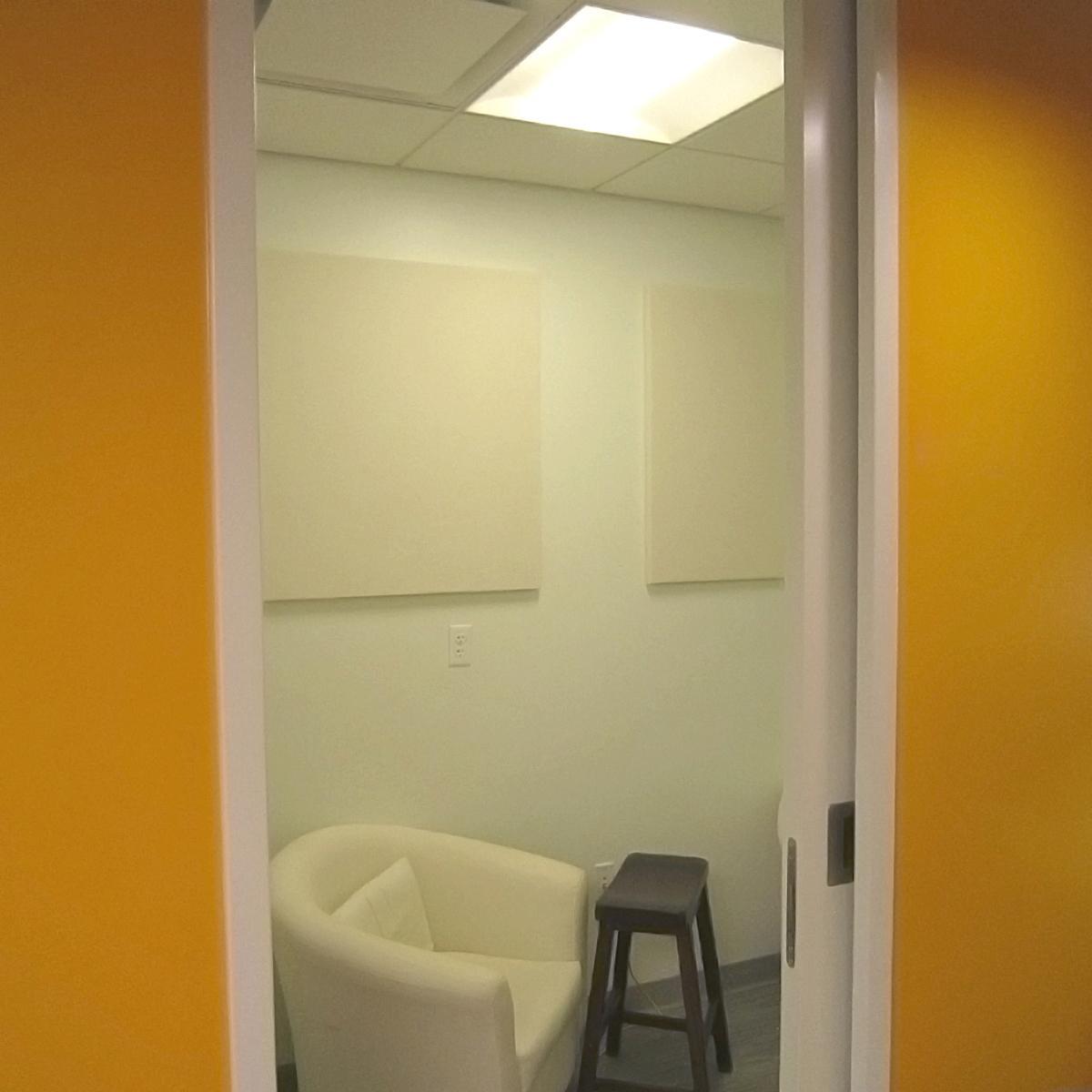 Internews installed fabric wrapped acoustic panels in their satellite conference rooms.