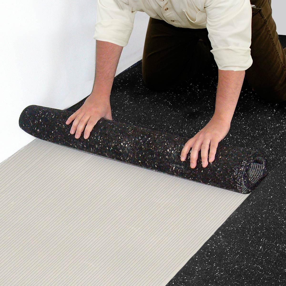 Iso-Step® Soundproofing Underlayment – Roll out and lay the Iso-Step into the adhesive bond.