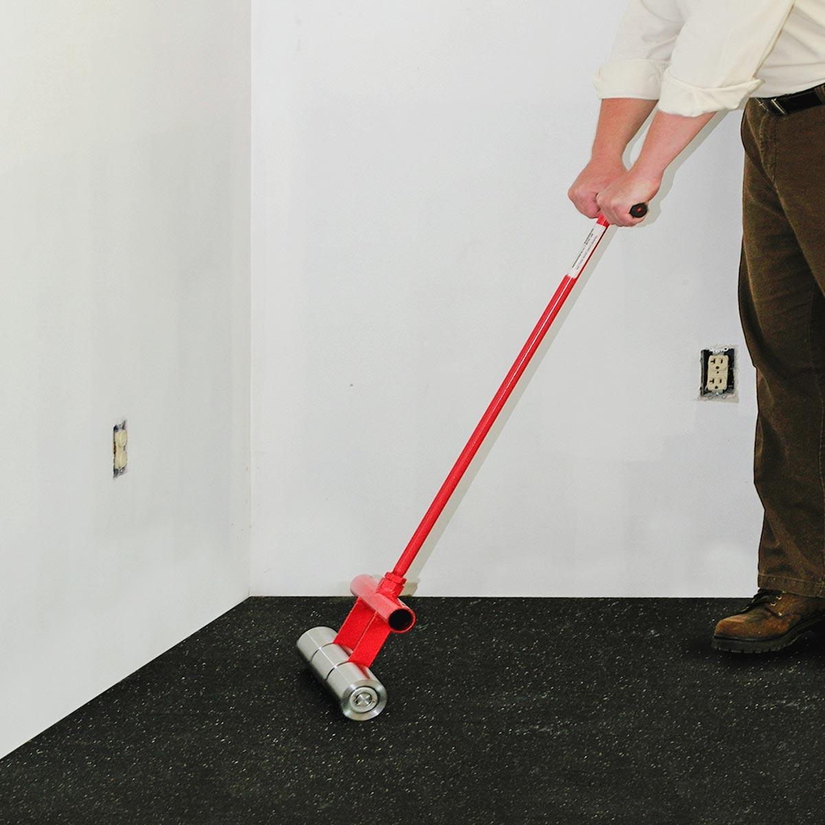 Roll the Iso-Step® with an approved flooring roller.