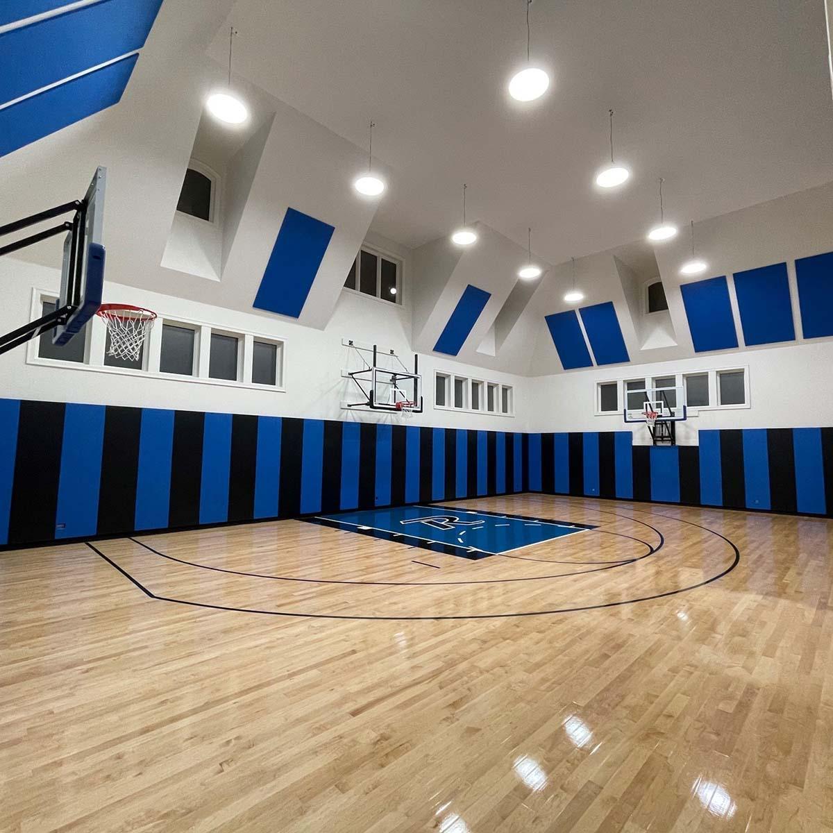 Fabric wrapped panels were installed on upper walls to reduce noise and reverberation.