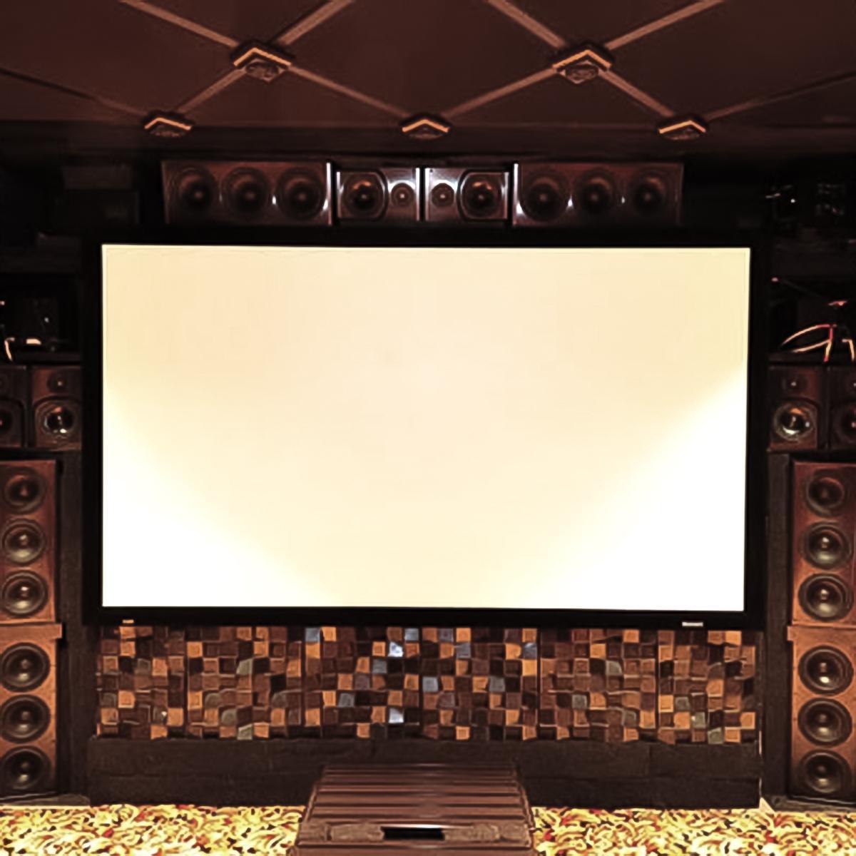 Ken Flick's home theater screen before the sound diffusers and speakers before they are hidden behind fabric.
