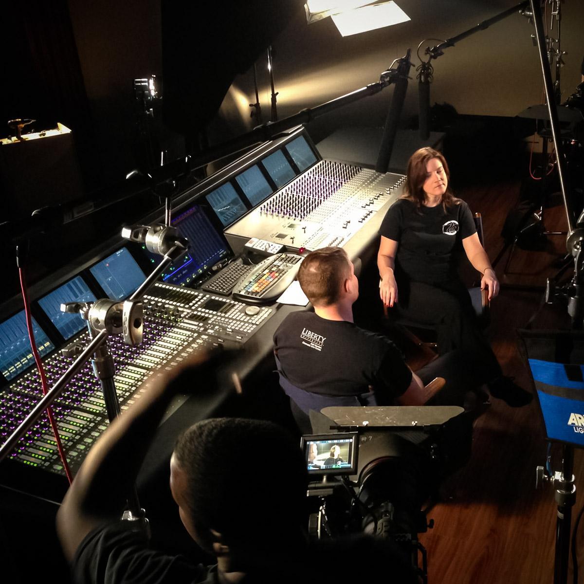 Liberty University Mixing Room - Students at mixing console in Film School mixing room.