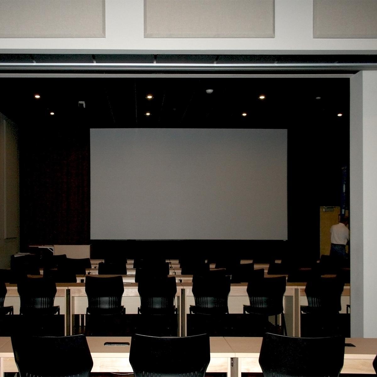 Fabric wrapped panels reduce reverberation in a screening room at Liberty University.