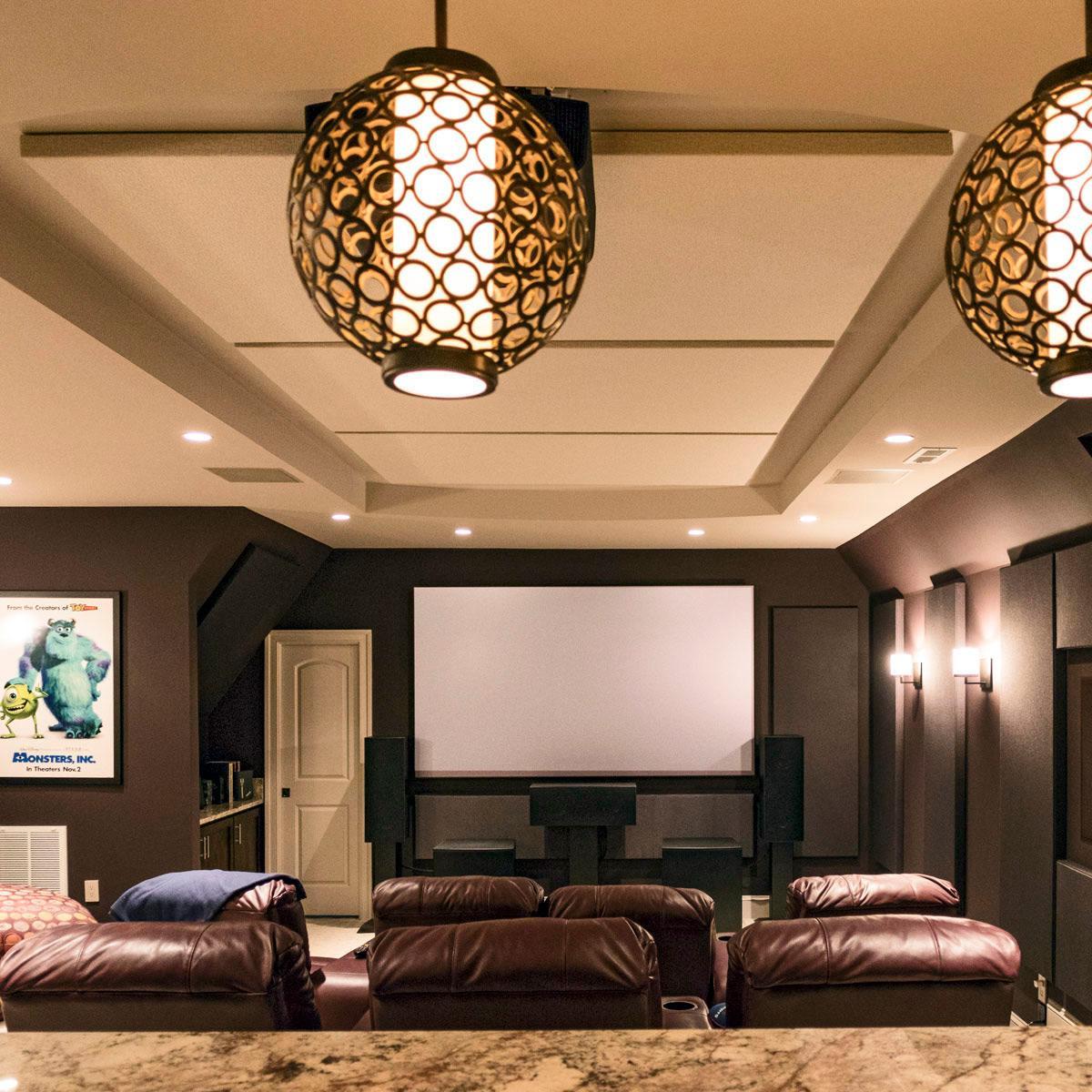 Two inch fabric wrapped panels installed over the theater seating and the bar area.