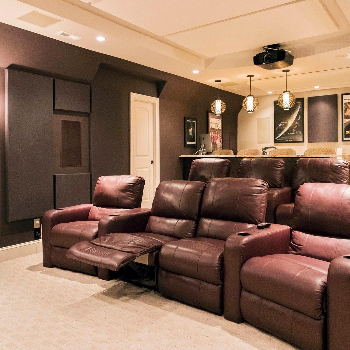 This Live Wire Home Theater utilized a fabric track system to combine absorption and diffusion for a seamless design.