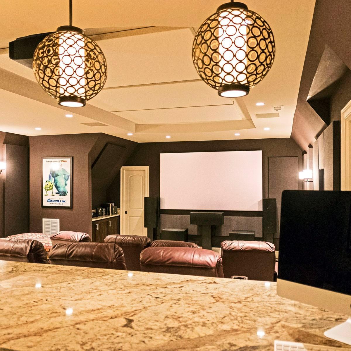 LiveWire Home Theater – Two inch fabric wrapped panels installed over the theater seating and the bar area.