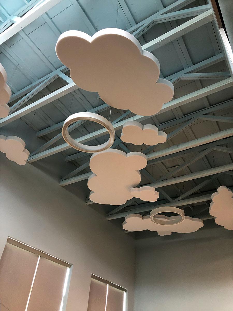 Lobar Associates outfitted a daycare with custom cut AlphaSorb Flat Foam Ceiling Clouds.