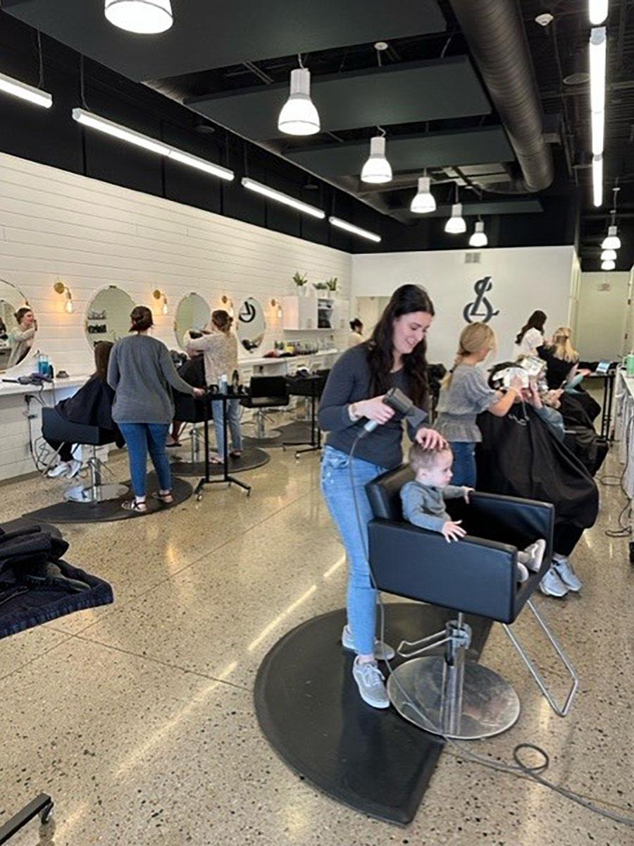 AlphaSorb® Fabric-Wrapped Ceiling Clouds Treat reverberation at Lucas Salon.