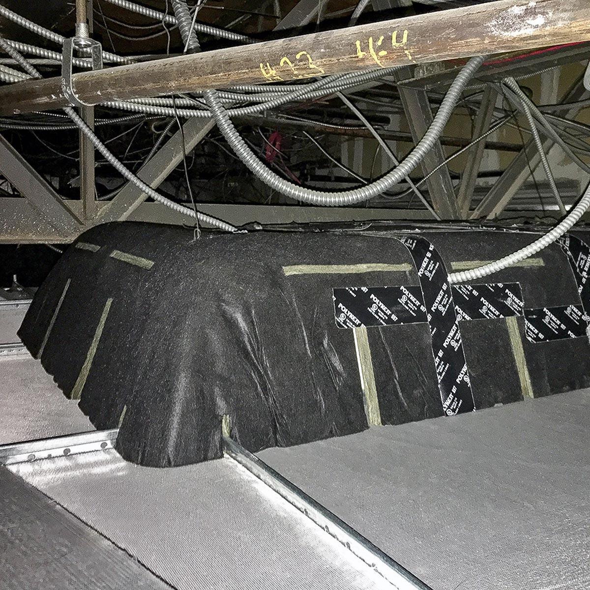 A PrivacyShield® light hood installed in the ceiling of a classroom at a major northeastern university to treat the acoustics in the space.